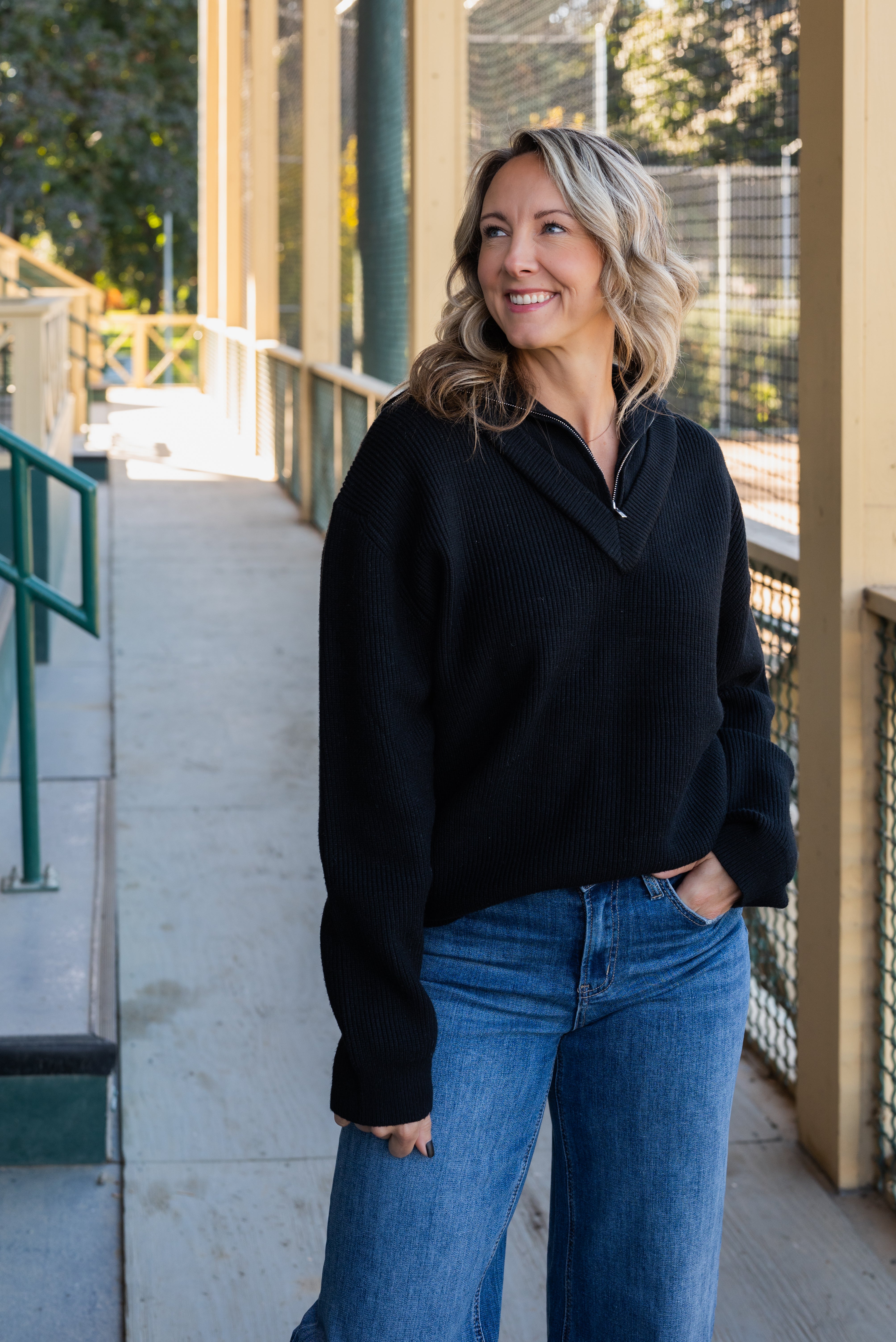 LOGAN HALF ZIP SWEATER