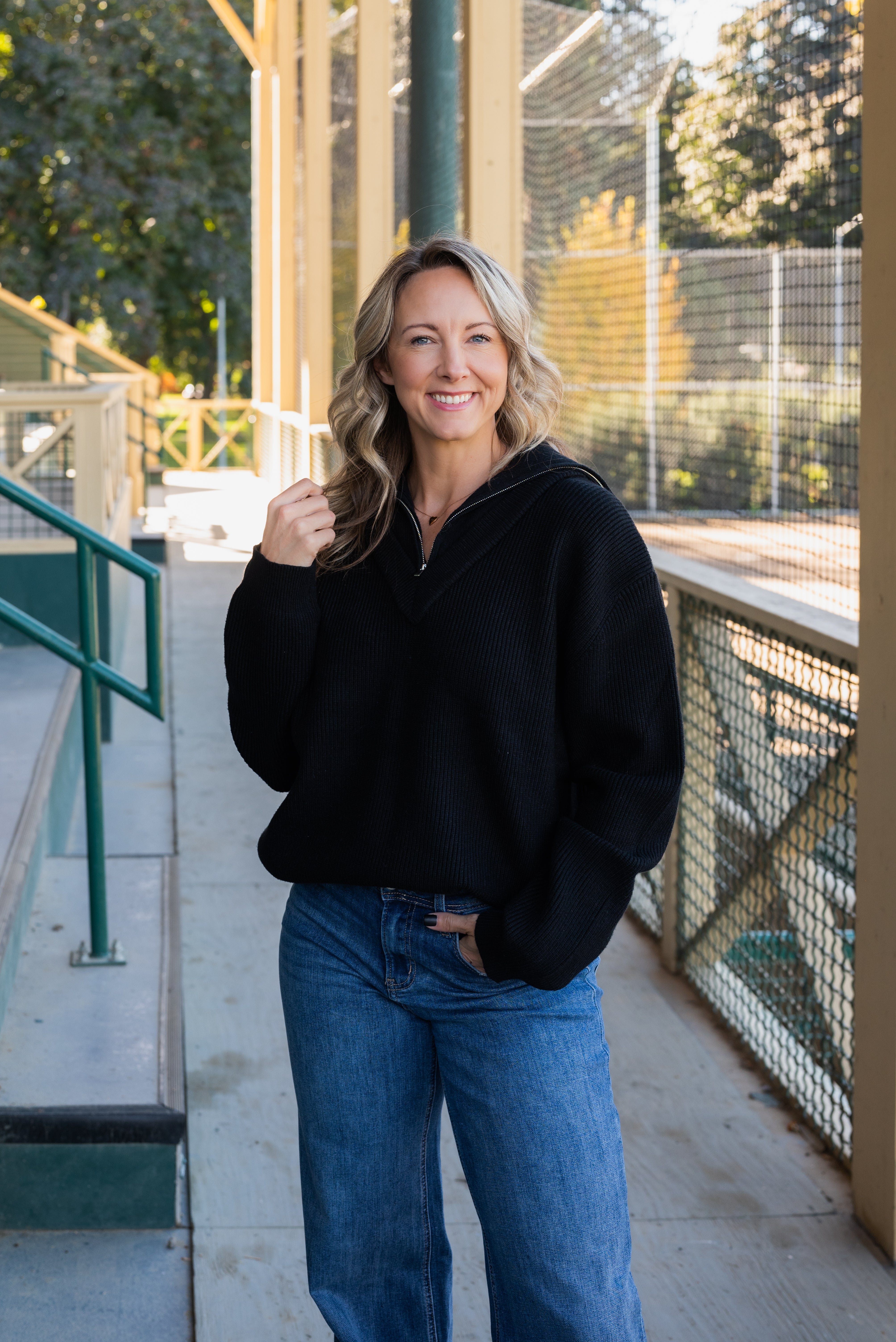 LOGAN HALF ZIP SWEATER