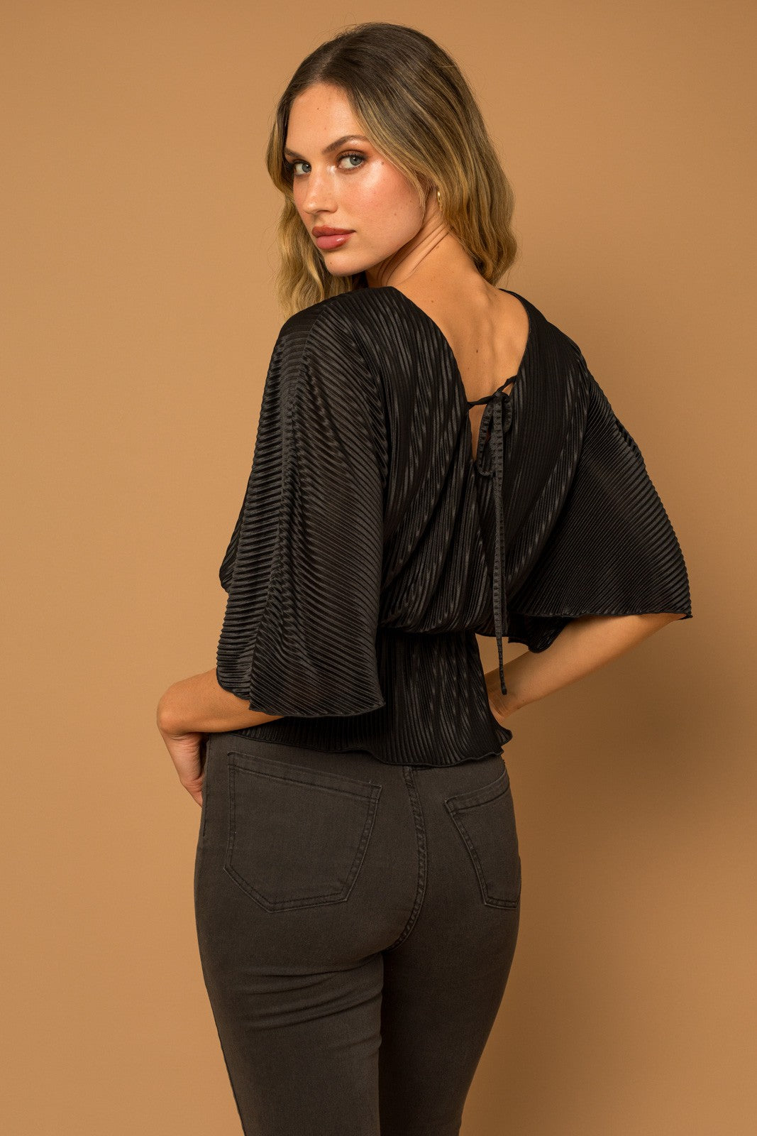 ERIKA PEPLUM TOP